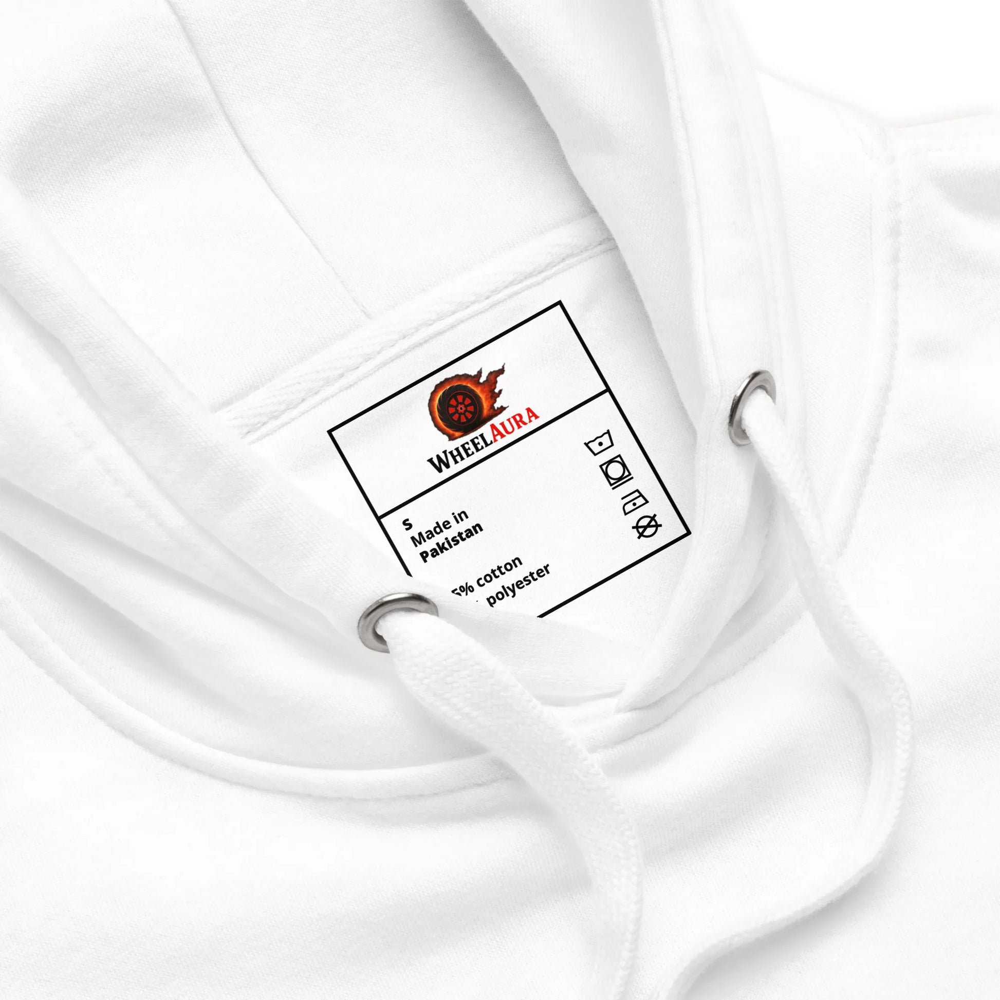 Inside label view of the Rebel Rider Hoodie in white, showing WheelAura branding and care instructions.